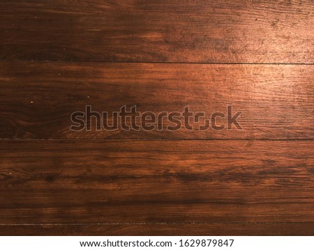 Brown soft wood surface as background for design. Vintage painted wooden texture, top view