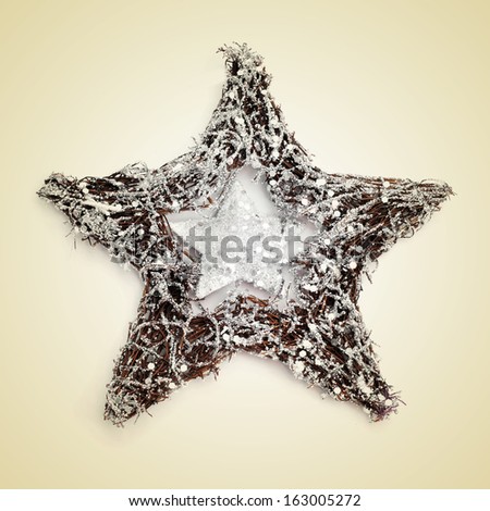 picture of a christmas star on a beige background with a retro effect
