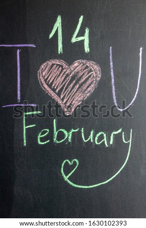 The inscription on the chalk board I love you, February 14th. Valentine's Day