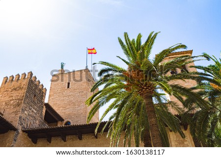 Almudaina Palace exterior view with defence bastion against blue sky, Palma de Mallorca, Balearic islands, Spain. Travel destination