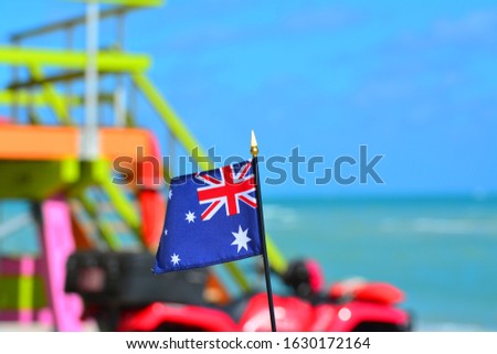 Beautiful National Flag of Australia on Tropical Beach
