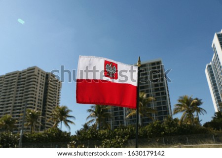 Beautiful National Flag of Poland on Tropical Beach