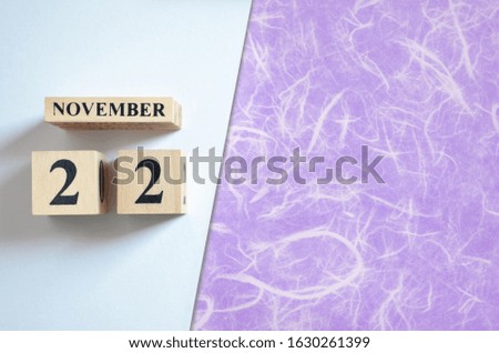 November 22, Empty white - violet background.