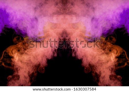 Smoke of pattern pink and red   in the form of horror monster on a dark isolated background.  Scary and mysterious symbol
