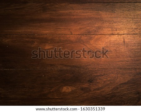 Closeup of  walnut wood texture for background with copy space for design. 