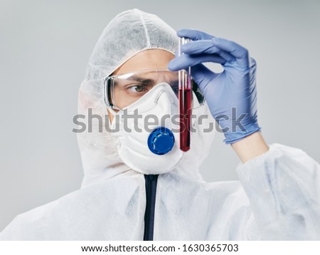 2019-ncov doctor injection fluid and medicine man beaker biology chemist porcelain control overalls DNA concept virus vaccine test tube coronavirus 