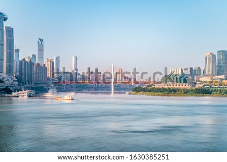 A close-up of the sunny scenery of high-rise buildings and Bridge cities in Chongqing, China with no chinese words in picture