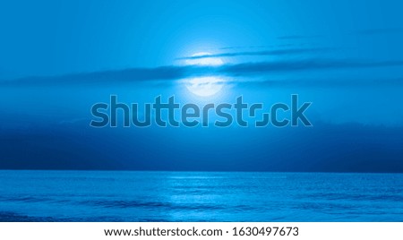 Night sky with moon in the clouds