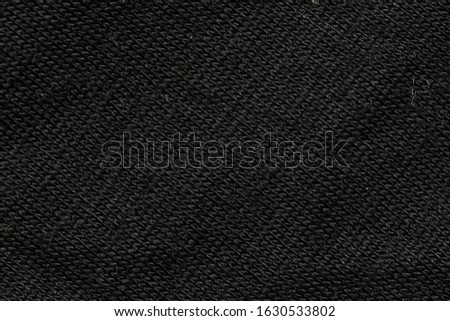 A closeup of a black fabric texture - a nice picture for backgrounds and wallpapers