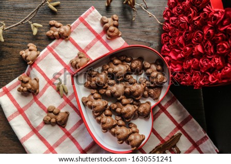 Valentine's Day heart- shaped chocolate candies. love concept for valentines day with sweet and romantic moment.