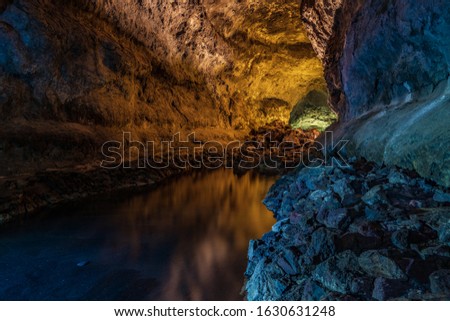 Cave Cueva de los Verdes and a lake on Lanzarote, Canary Islands .