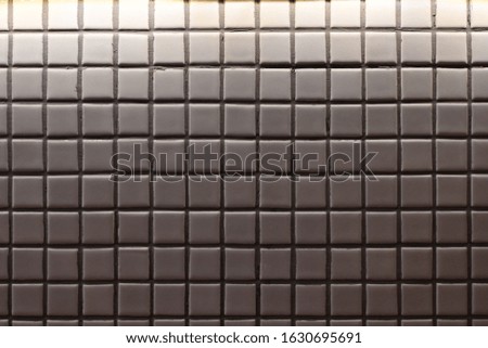 small white mosaic tile decoration on wall background