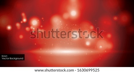 Festive red luminous background with red lights blurred bokeh.