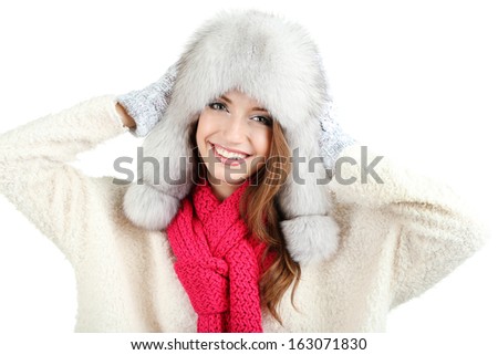 Beautiful smiling girl in hat isolated on white
