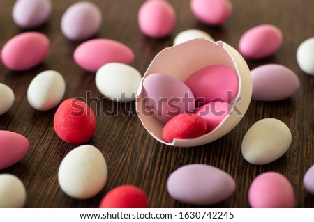 Multi-color Easter Eggs Pattern on wooden background. Easter background or easter concept. Happy Easter