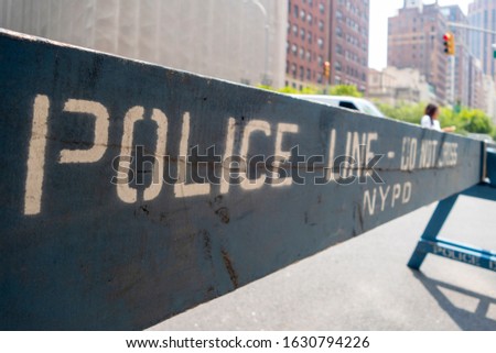 new york city police line do not enter wood horse blockers for cars and pedestrians 