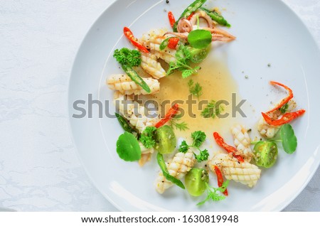 Stir fried squid with chilli and brocolli