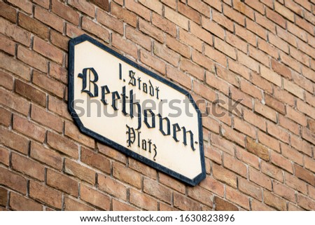 Street sign of Beethovenplatz on a brick building in Vienna (Austria)