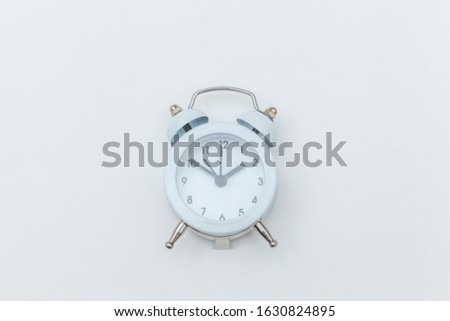 Simply flat lay design Ringing twin bell vintage classic alarm clock Isolated on white background. Rest hours time of life good morning night wake up awake concept. Flat lay top view copy space