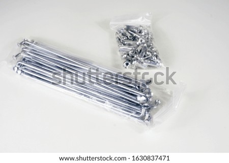 Motorcycle spokes, plated on a white background