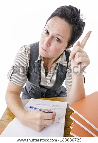 strict teacher marking students work on white background