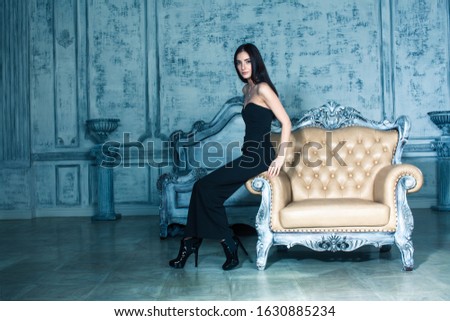 beauty young brunette woman in luxury home interior, fairy bedroom rich people concept