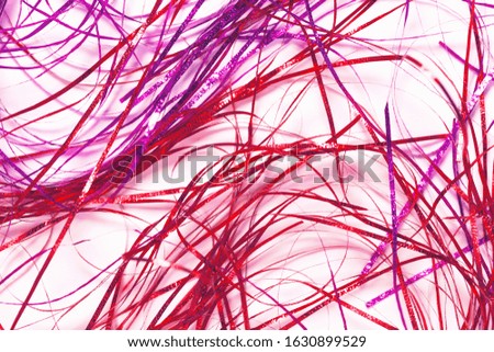 Colorful serpentine close up on white background. Abstract festive and party concept backdrop for seasonal and invitation cards, web design.