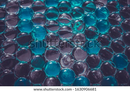 Gel balls. Macro of blue hydrogel background 