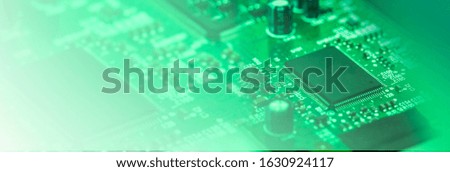 Circuit board background in green colour with copy space