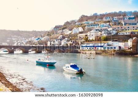 A sunset at Looe Harbour , On a winter day  Royalty-Free Stock Photo #1630928098