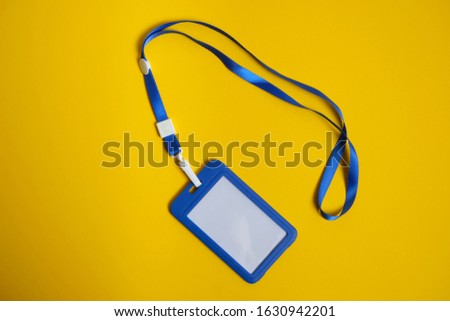 Security Badge on yellow background, invitation letter concept, job finding