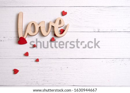 Valentines day card with red hearts on a wooden background, love message. Love concept. Romantic.