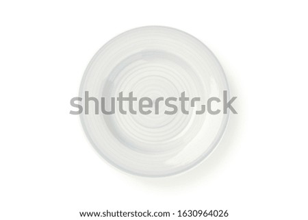 Blue clean plate isolated on white background. Kitchen, serving