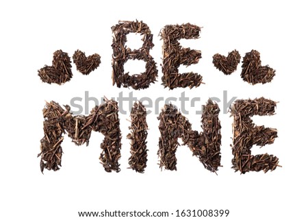 Be Mine quote and hearts made with dried tea leaves placed on white background from the top view can use for your messages