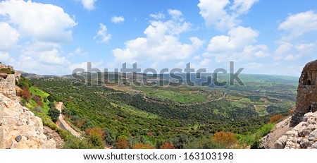 Panoramic view of the Golan Heights from fortress Nimrod - the medieval fortress located in northern part of the Golan Heights, on a crest about 800 m high above sea level. National park, Israel  Royalty-Free Stock Photo #163103198