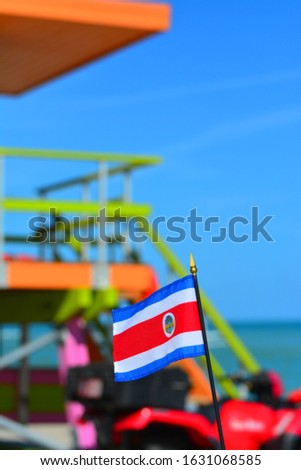 Beautiful National Flag of Costa Rica on Tropical Beach