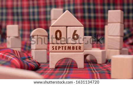 September 6 written with wooden blocks