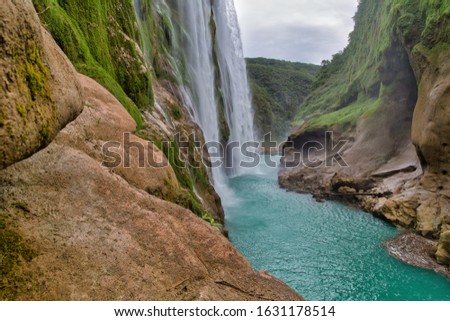 the River And Amazing Blue Tamul Waterfall.