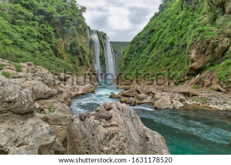 Green Background Scenic view of spectacular Tamul Waterfall, Tampaon River, Huasteca Potosina, Mexico