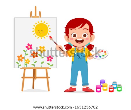 happy cute little kid girl draw on canvas