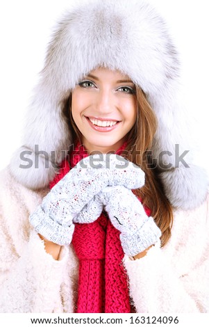 Beautiful smiling girl in hat isolated on white