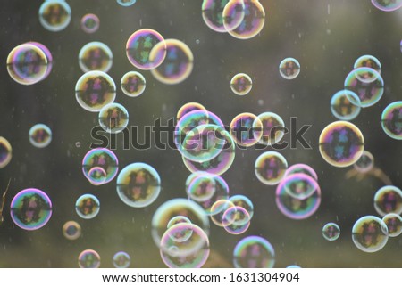bubbles in the rain on the river