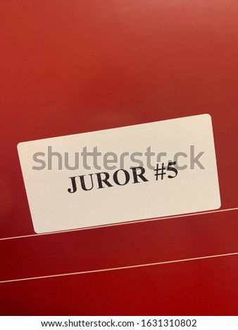 View of a label on a juror notebook for note taking. Royalty-Free Stock Photo #1631310802