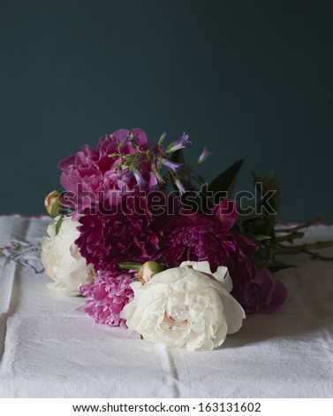 Still life with white peonies in vase