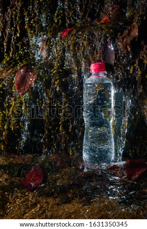 Plastic bottle with drinking water.