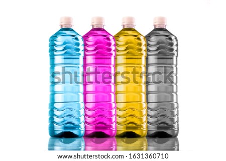 bottles with four basic printing colors CMYK