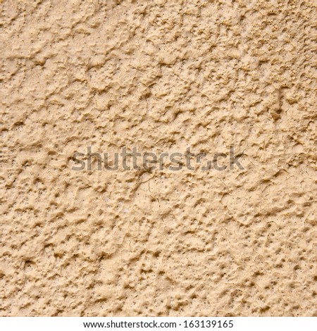 Grain yellow paint wall background or texture