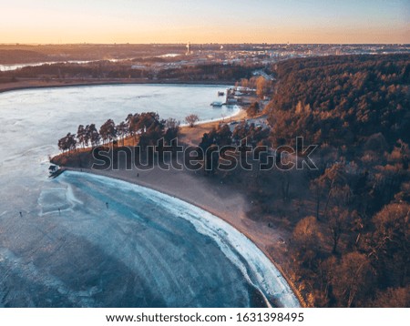 Frozen Kaunas sea. Winter season in Lithuania. Drone aerial view