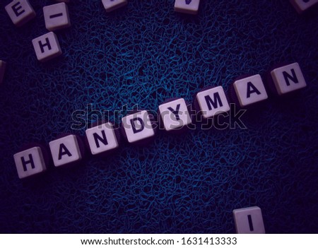 Handyman, word cube with background.