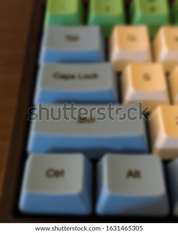 PC keyboard on the table with blurry view. primary equipment for computers.